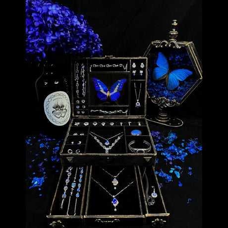 Luxury Blue Morpho butterfly jewelry box featuring a real Morpho helena butterfly display with handmade butterfly wing jewelry collection.