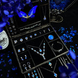 Open Blue Morpho butterfly jewelry box showcasing organized jewelry compartments and vibrant Morpho helena butterfly wings.